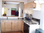 gas range, maple cabinets, dishwasher