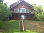 Front window on bottom of house is the unit