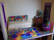 I love this bedroom - it's so bright and cheerful. The fabric really is beautiful and bold.