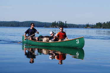 little guys in canoes