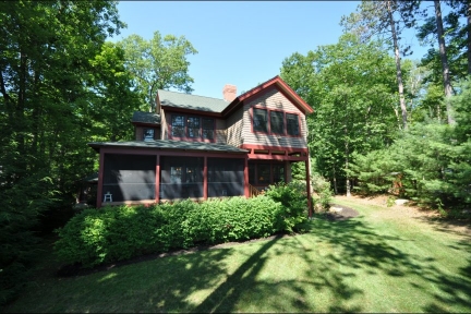 Great Winnipesaukee Summer Rental!  Southwest Exposure!  Quiet, Peaceful Location.  Premier Builder!:&nbsp;Charming 4 bedroom home! $4950 a week.  Sleep 8.  This Cargill Blake luxury lake house was designed with a Frank Loyd Wright influence. Located in one of the most private areas on Winnipesaukee. Loons are frequent visitors.  This is a rare spot! This is one of the few places on the lake so peaceful that loons love to sing nearby in the evenings. A very charming bunkhouse with fireplace and screen porch also graces this property and could be used as a seasonal bedroom. The home has 4 bedrooms or you can use the 4th bedroom as a family room, complete with full bath and wood stove hook up. Heart pine floors, large NH fieldstone fireplace in the living room, and screen porch on the main house. Enjoy sunsets and southwesterly views of the twin islands and Gunstock Mountain. The landscape includes a lawn on both the lakeside and roadside, gardens with perennials, walkways and beautiful old maple trees. 1.3 miles to Bald Peak Colony Club. 10-20 minutes to Moultonborough, Wolfeboro and Center Harbor amenities.