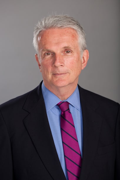 B. John Dill, CRE, FRICS